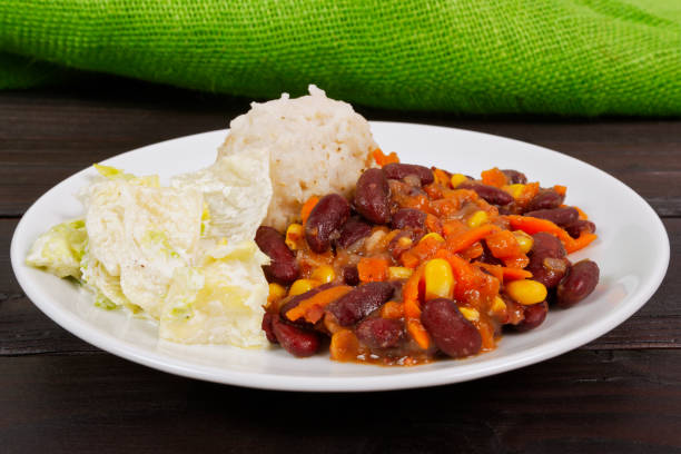 istock Red beans with corn and carrot, sorghum on a table 942262836