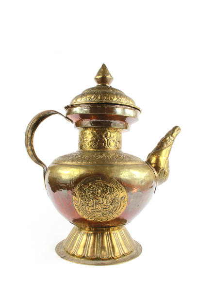 istock Silver Metal Ornate Tea Pot on White Background 942265226