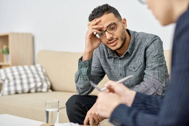 istock Psychologist Consulting Depressed Patient 942265600
