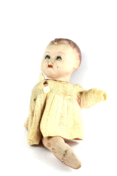 istock Close Up and Isolated Vintage Antique Old Doll 942266188