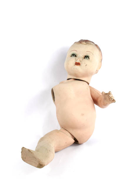 istock Close Up and Isolated Vintage Antique Old Doll 942266836
