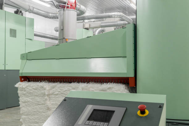 istock carding machine in textile factory 942271704