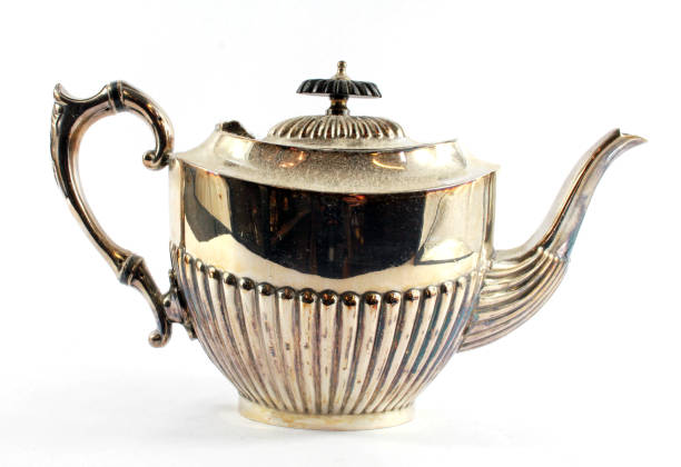 istock Silver Metal Ornate Tea Pot on White Background 942272684