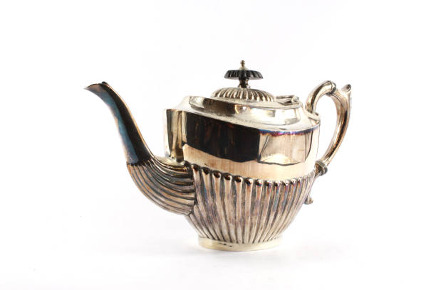 istock Silver Metal Ornate Tea Pot on White Background 942272712