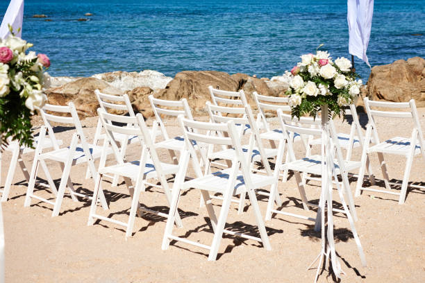 istock The white chairs for beach wedding ceremony during preparation 942287726