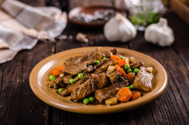 istock Pork medallions with vegetable and soy garlic sauce 942290690