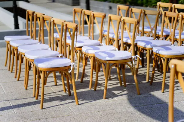 Photo of Folding lawn chairs setup for beach wedding - Front, Side view with deph