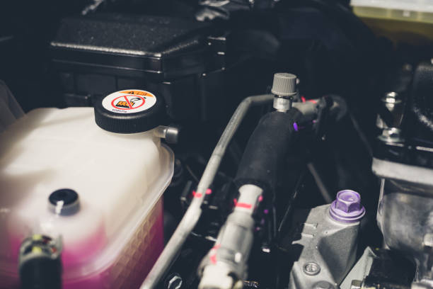 istock Coolant tank and warning information in engine room 942297320