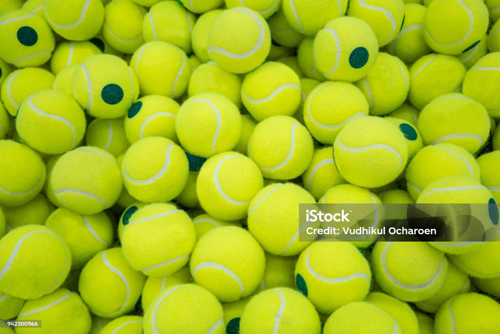 Lot of virant tennis balls for sport background Tennis Ball Stock Photo