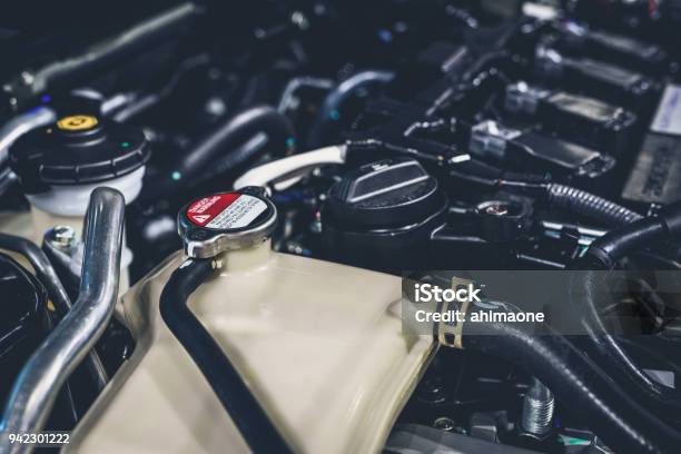 Coolant Tank And Warning Information In Engine Room Stock Photo - Download Image Now