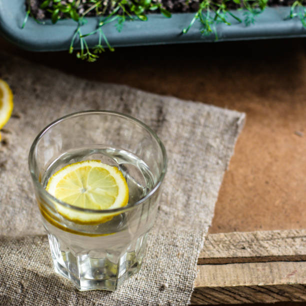 istock glass of water with lemon (a slice of lemon in pure water) 942301482