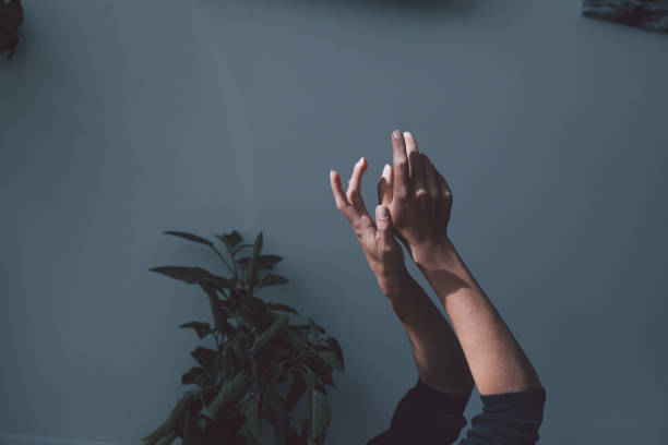istock Cropped image of hand in front of wall 942301894