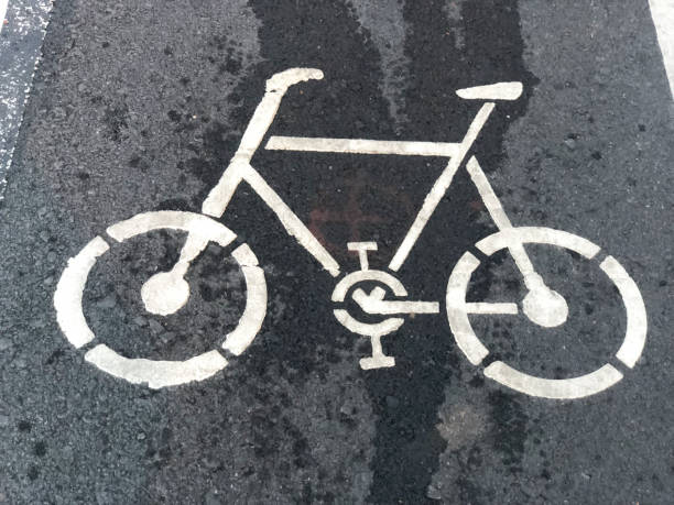istock Bicycle lane signage on street, close up 942305796