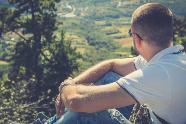 istock Man enjoying beautiful mountain landscape 942306204