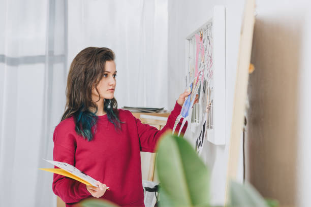 istock Young woman creating mood board 942310034