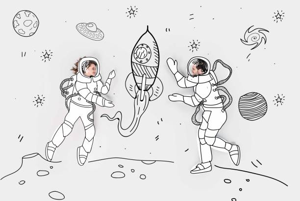 istock creative hand drawn collage with couple in space suits and rocket 942310530