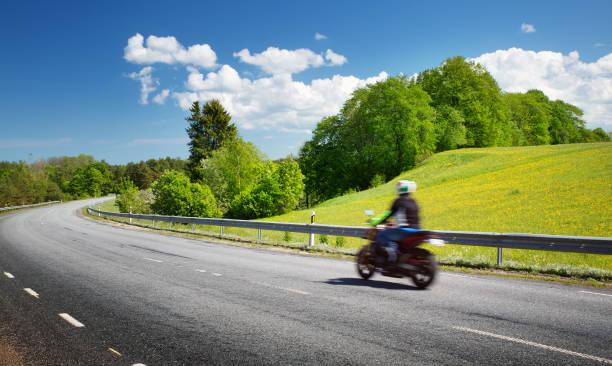 istock Motobike on asphalt road in beautiful summer evening 942321406