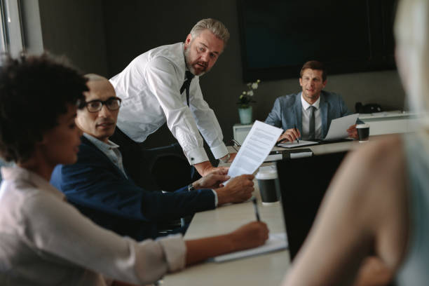 istock Multi-ethnic business team having meeting on conference room 942325048