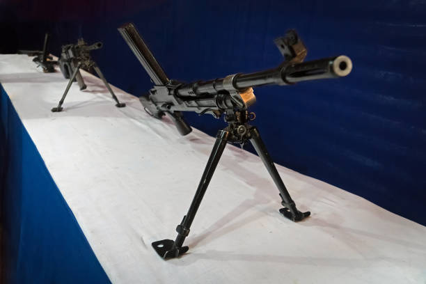 istock different rifles on the counter in the gun shop. 942325312