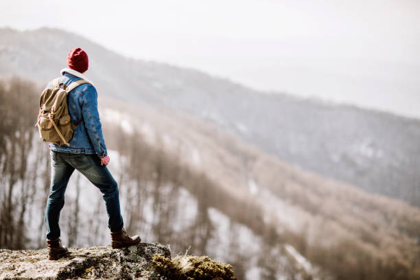 istock Man standing on the mountain top 942341388