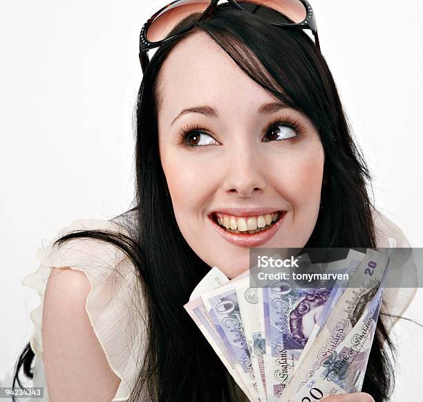 Smiling Brunette Young Woman With Handful Of Canadian Cash Stock Photo - Download Image Now