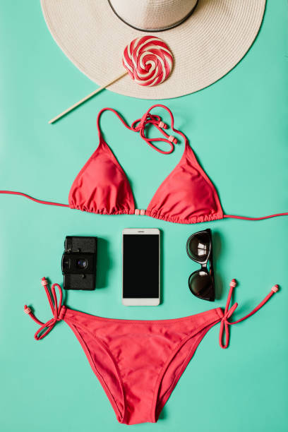 istock Summer vacation concept with pink bikini suit, hat and accessories 942344956
