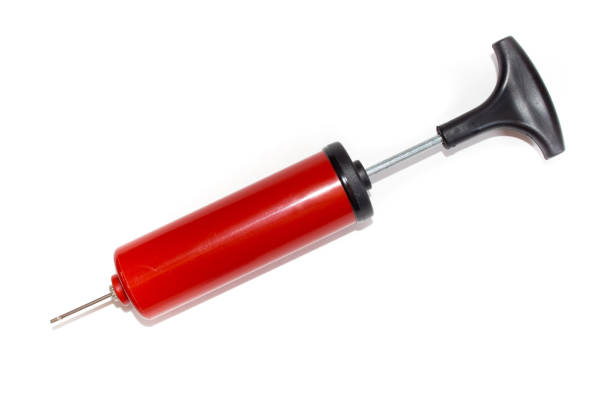 istock The pump to inflate balls on a white background. 942354808