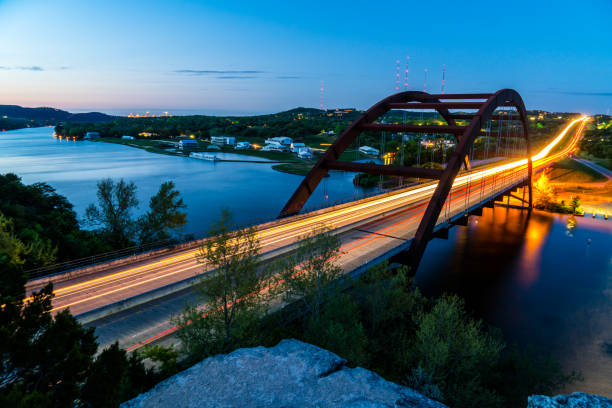 360 bridge or Pennybacker bridge before dawn Austin Texas cityscape Texas hill country landscape. Long time lapse long exposures
