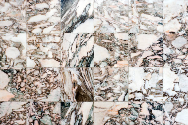 istock Spotted marble slab. Granite tiles on the floor 942354836