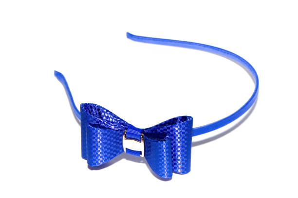 istock Blue headband with bow isolated on white background. 942355106