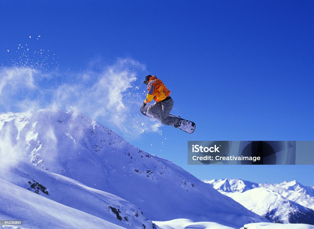 Snowboard-Jump - Lizenzfrei Snowboardfahren Stock-Foto