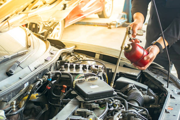 istock man with engine on car service blurry background. for transport or garage image. 942360304