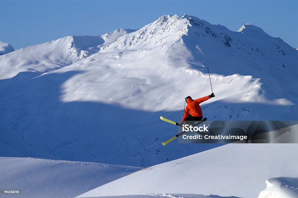 A skier in a red jacket performing a jump My frend Ale Skiing Stock Photo