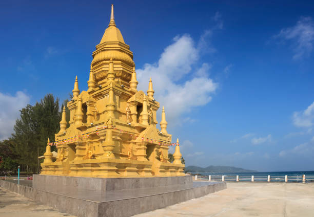 Laem Sor Pagoda Small, golden pagoda with ornate details in a serene oceanfront setting in Taling Ngam, Ko Samui