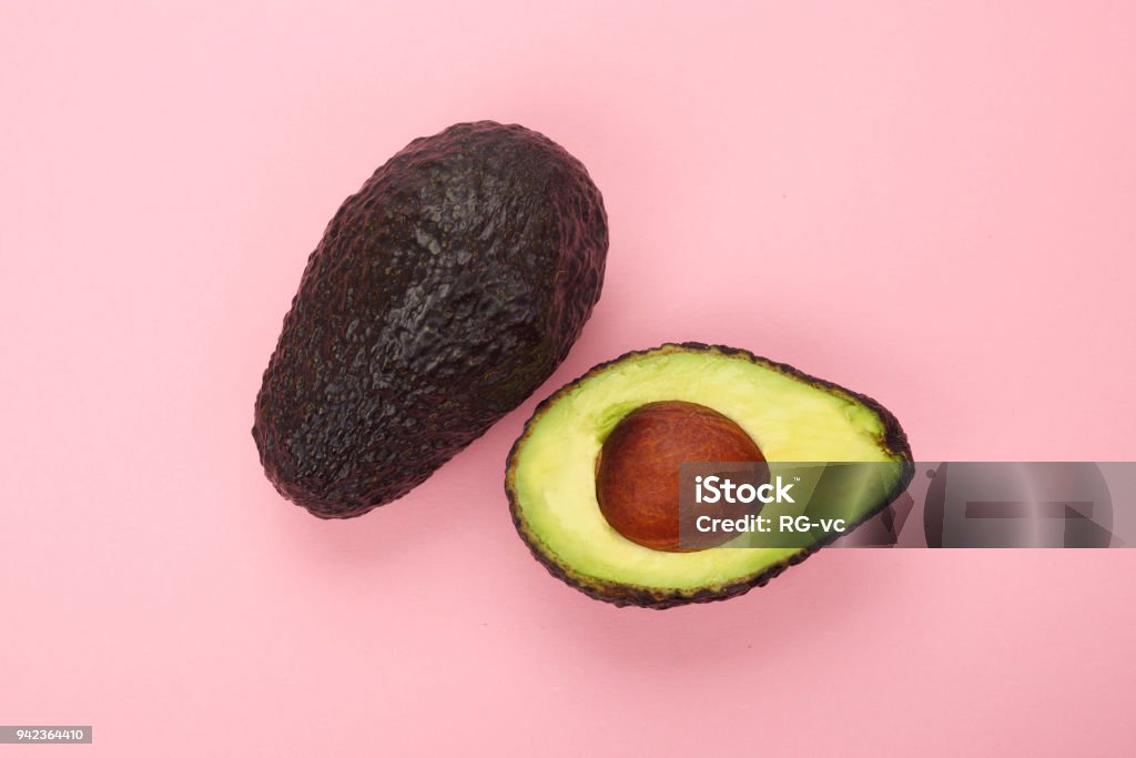 Top view of a ripe sliced avocado isolated Avocado Stock Photo