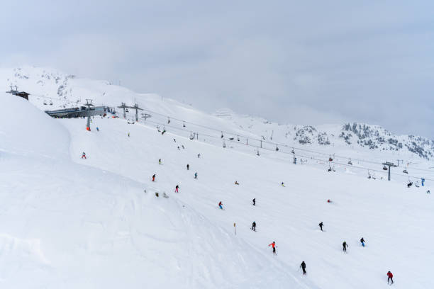 Lots of people skiing on a track  on the Hochzillertal mountain, Tyrol, Austria
