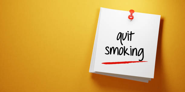 istock White Sticky Note With Quit Smoking Message And Red Push Pin On Yellow Background 942370526