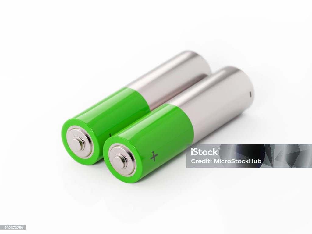 AA Size Two Green Batteries On White Background AA size green and silver colored  two batteries on white background. Horizontal composition with copy space. Battery Stock Photo