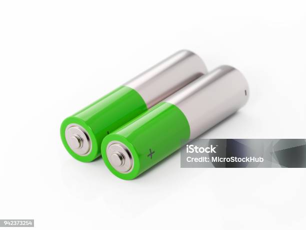 Aa Size Two Green Batteries On White Background Stock Photo - Download Image Now - Battery, High Angle View, Cut Out