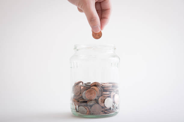 saving penny image saving penny image a penny saved stock pictures, royalty-free photos & images