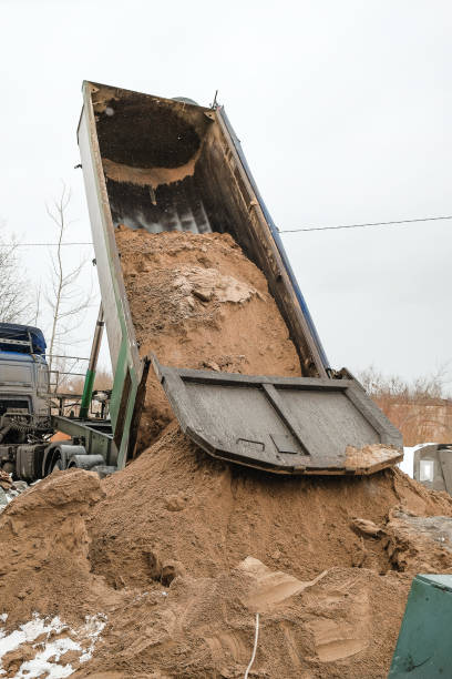 istock the truck pours the sand 942381526