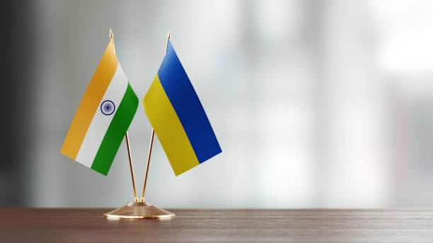 istock Indian And Ukrainian Flag Pair On A Desk Over Defocused Background 942381584