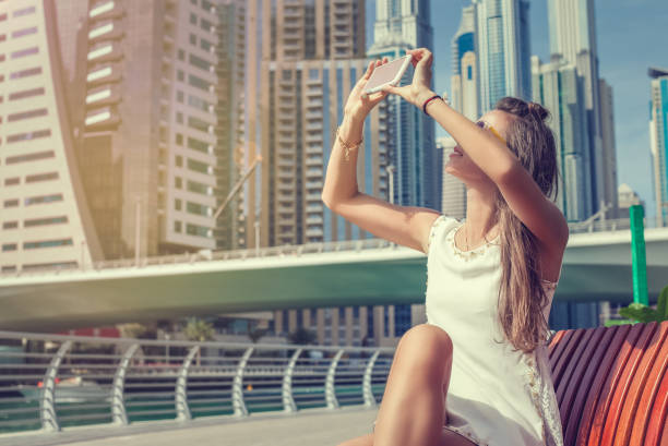 istock Tourist taking photo in Dubai 942382032