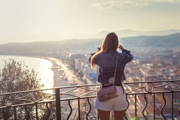 istock Woman enjoying sunset 942385148
