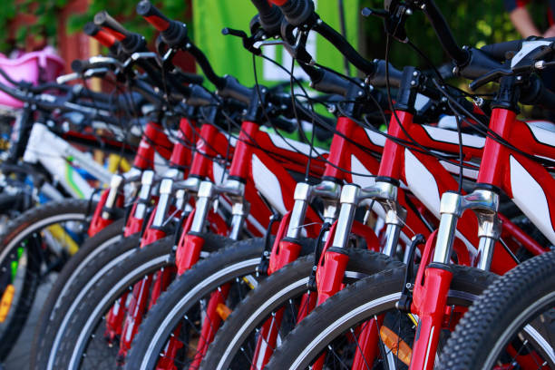 istock many bicycles stand in a row 942385688