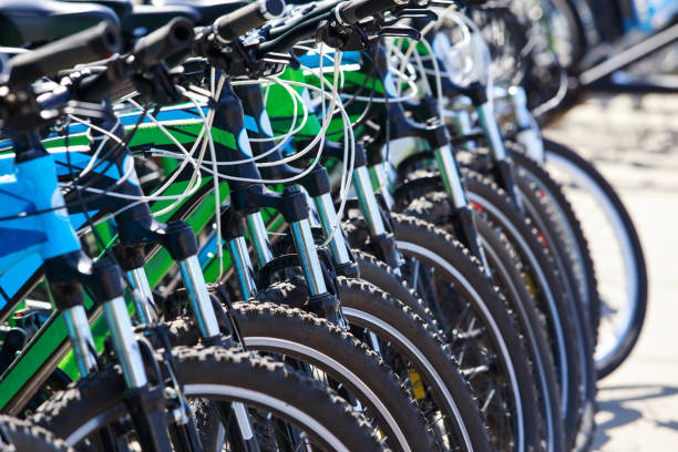 istock many bicycles stand in a row 942387224