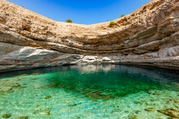 istock bimmah sinkhole, sultanate of oman 942390748