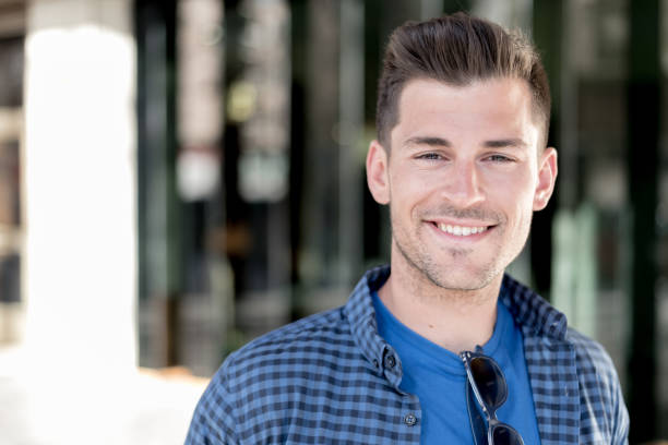 istock man close up smiling to the camera 942398046