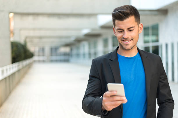 istock man close up with a mobile phone 942399930