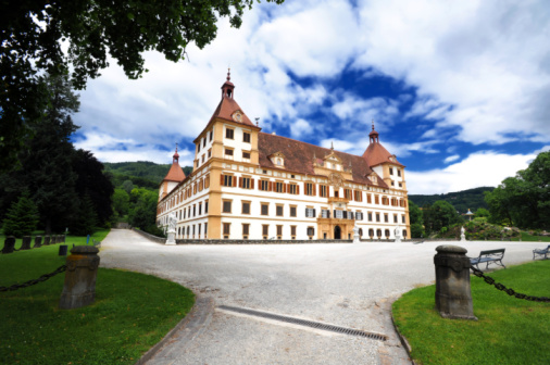 October 30, 2023: Sinaia, Romania - Peles Castle. Peles Castle is a castle in Romania located in Sinaia. This photo shows the castle from the exterior and was taken during a rainy day.